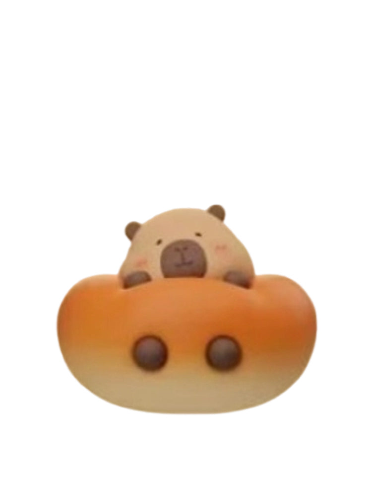 Tun Bread capybara mini figure peeking out of a round bread roll, from the Tuntunzai Bakery V2 series