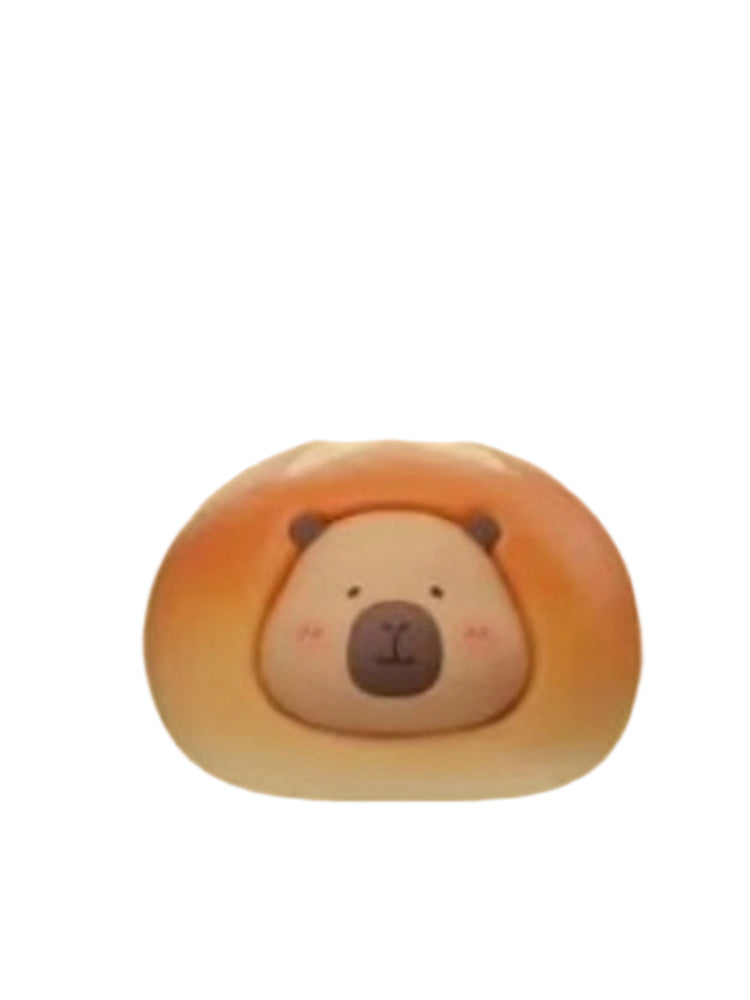 Alkaline Bread capybara mini figure shaped like a round golden bun, from the Tuntunzai Bakery V2 series