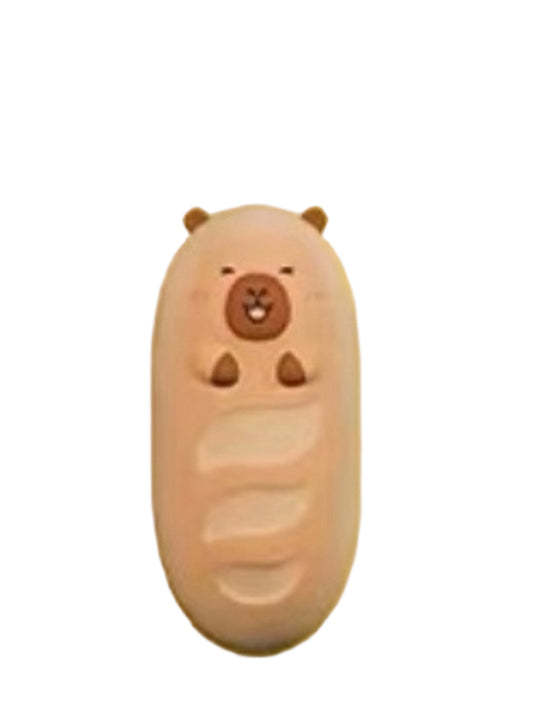 Baguette capybara mini figure shaped like a long baguette with a capybara face, from the Tuntunzai Bakery series