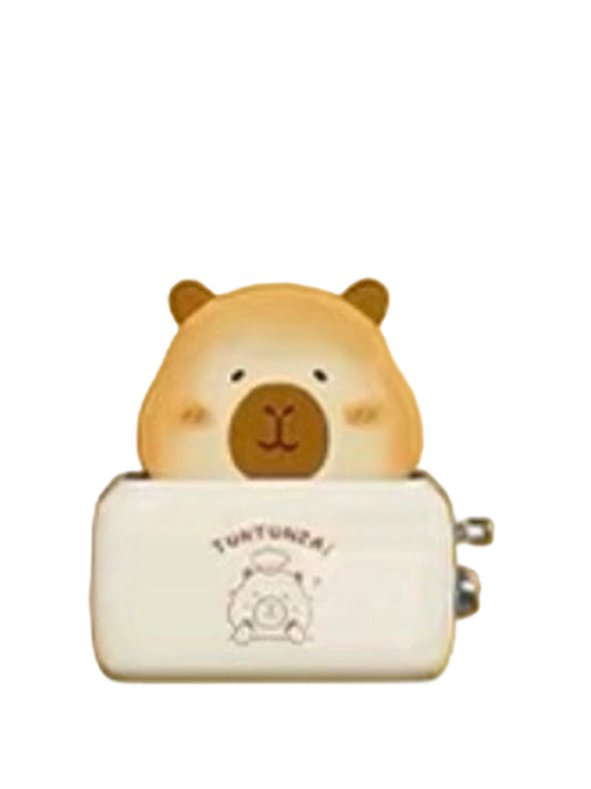 Bread Machine capybara mini figure popping out of a toaster as a slice of toast, from the Tuntunzai Bakery series