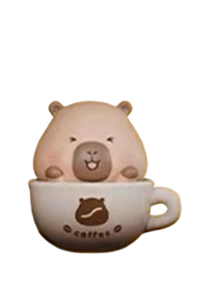 Cafe Americano capybara mini figure sitting in a white coffee cup, from the Tuntunzai Bakery series