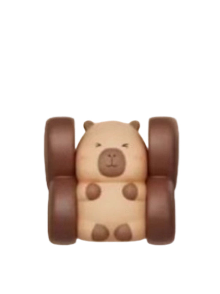 Choco-covered capybara mini figure sandwiched between two chocolate bar pieces, from the Tuntunzai Capybara Chocolate series