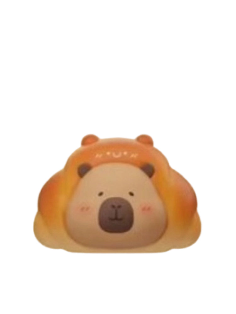 Croissant capybara mini figure wearing a golden croissant hood, from the Tuntunzai Bakery V2 series