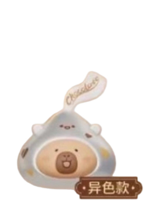 Delicious Silver Candy Special color variant capybara mini figure dressed as a silver foil chocolate kiss, from the Tuntunzai Capybara Chocolate series