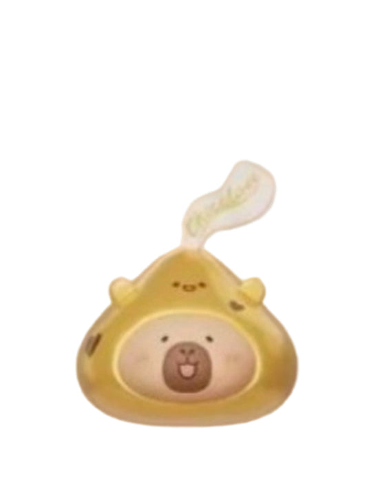 Delicious Tuntun capybara mini figure dressed as a gold foil chocolate kiss, from the Tuntunzai Capybara Chocolate series