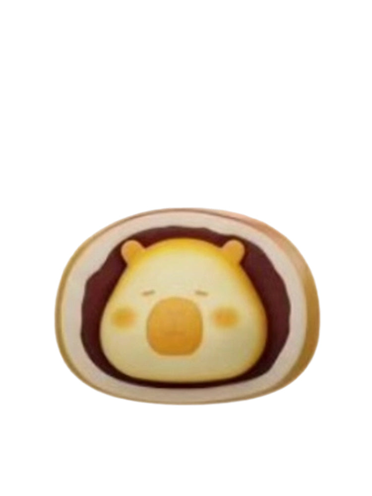 Egg Yolk Crisp capybara mini figure as the golden yolk center of an egg yolk pastry, from the Tuntunzai Bakery V2 series