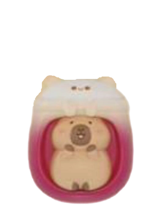 Euryale Seed capybara mini figure inside a pink and white euryale seed, from the Tuntunzai Wellness series