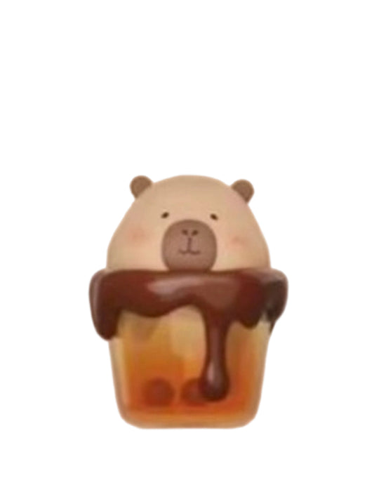 Hot Cocoa Mug capybara mini figure in a glass mug of hot cocoa dripping with chocolate, from the Tuntunzai Capybara Chocolate series