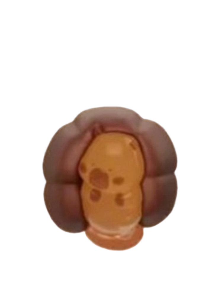 Lava Dark Choco capybara mini figure inside a dark chocolate lava cake with a caramel center, from the Tuntunzai Capybara Chocolate series