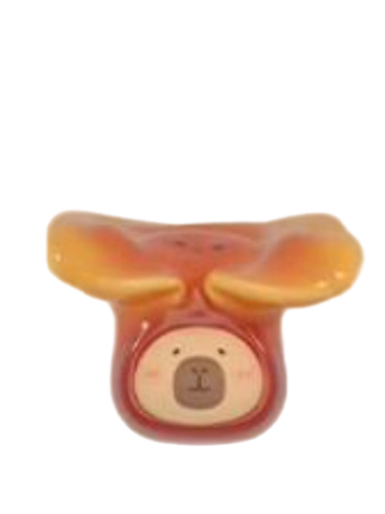 Lingzhi capybara mini figure wearing a red lingzhi mushroom cap, from the Tuntunzai Wellness series