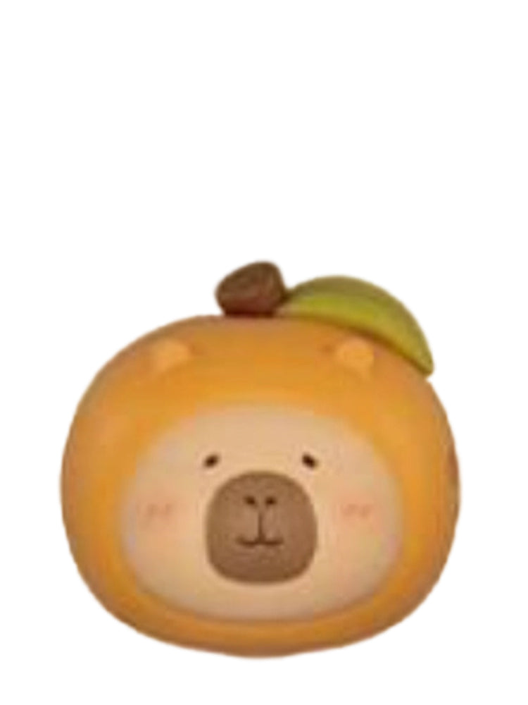 Loquat capybara mini figure in an orange loquat fruit costume with a leaf, from the Tuntunzai Wellness series