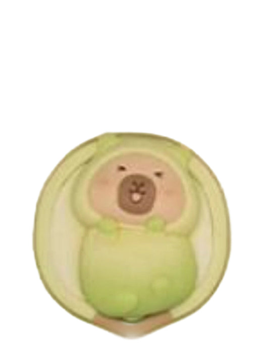 Lotus Seed capybara mini figure curled inside a green lotus seed, from the Tuntunzai Wellness series