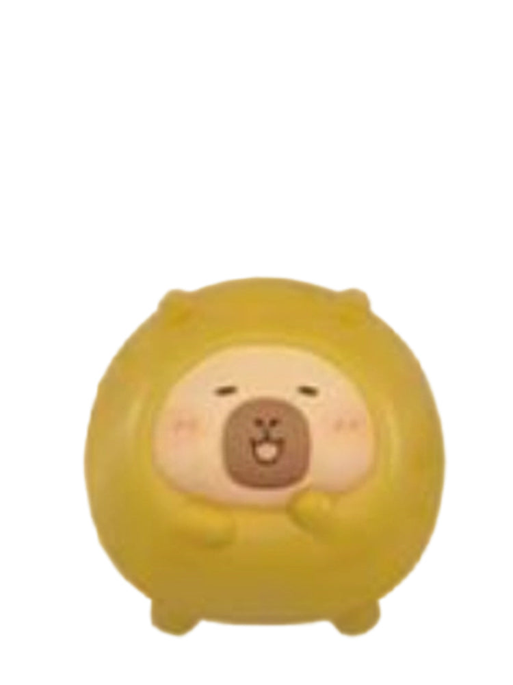 Monk Fruit capybara mini figure in a round monk fruit costume, from the Tuntunzai Wellness series