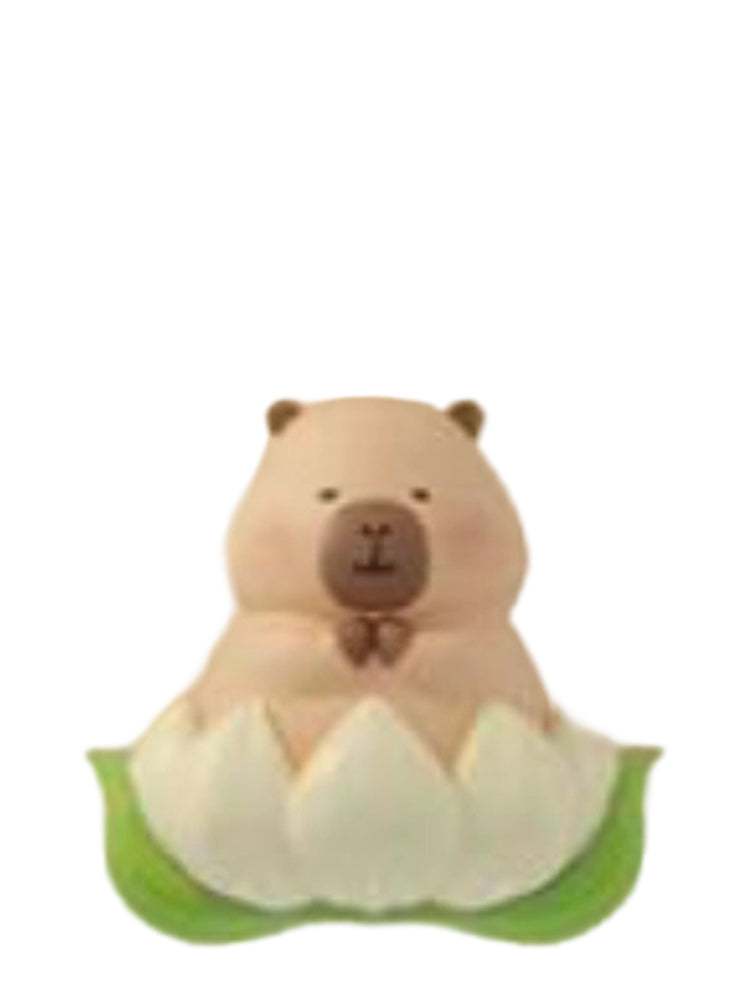 Snow Lotus capybara mini figure sitting in a white snow lotus flower, from the Tuntunzai Wellness series