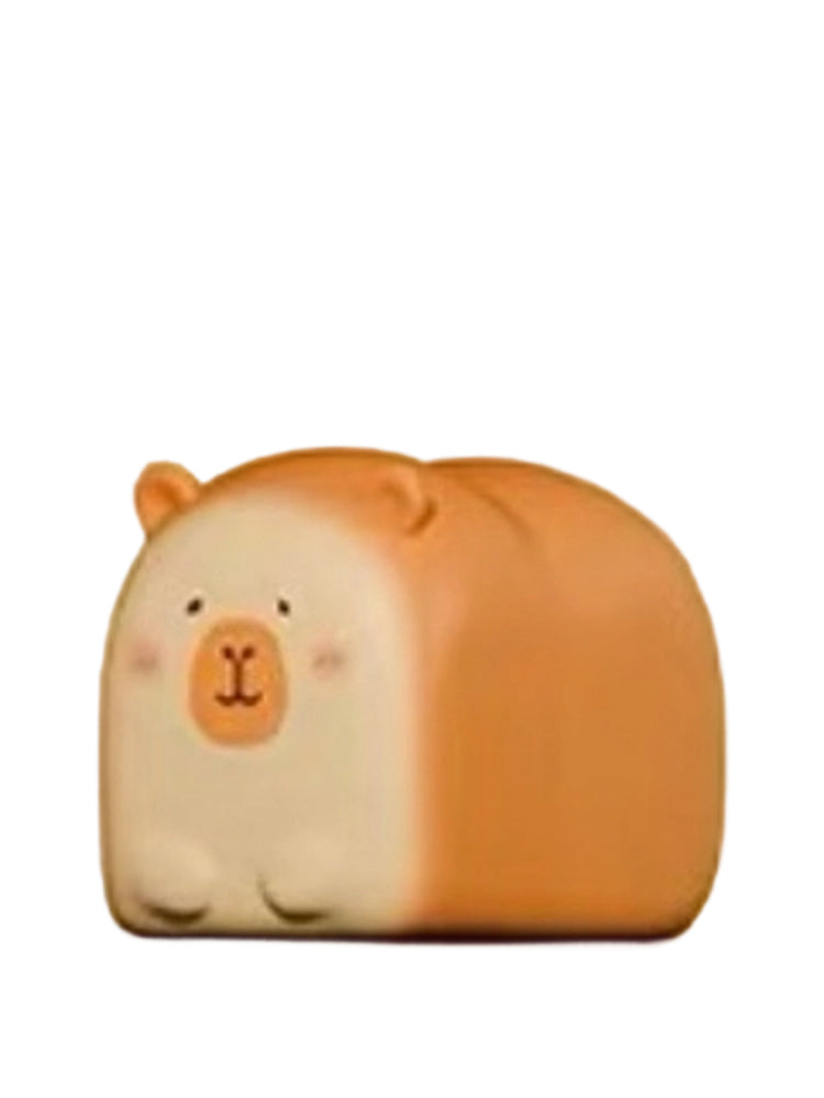 Toast capybara mini figure shaped like a loaf of bread with a capybara face, from the Tuntunzai Bakery series