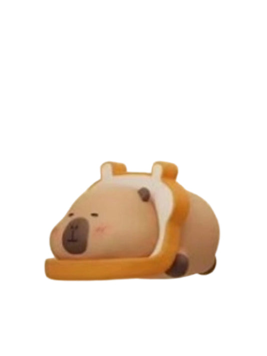 Toast capybara mini figure lying inside a slice of toast, from the Tuntunzai Bakery V2 series