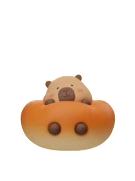 Tun Bread capybara mini figure peeking out of a round bread roll, from the Tuntunzai Bakery V2 series