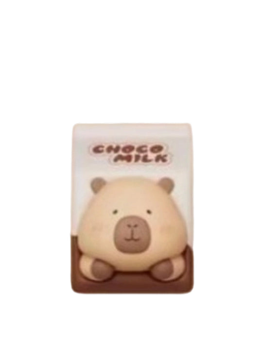White Choco Milk Carton capybara mini figure tucked into a white Choco Milk carton, from the Tuntunzai Capybara Chocolate series